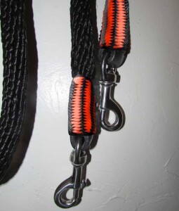 Handmade reins, orange black trim AMREIN0021